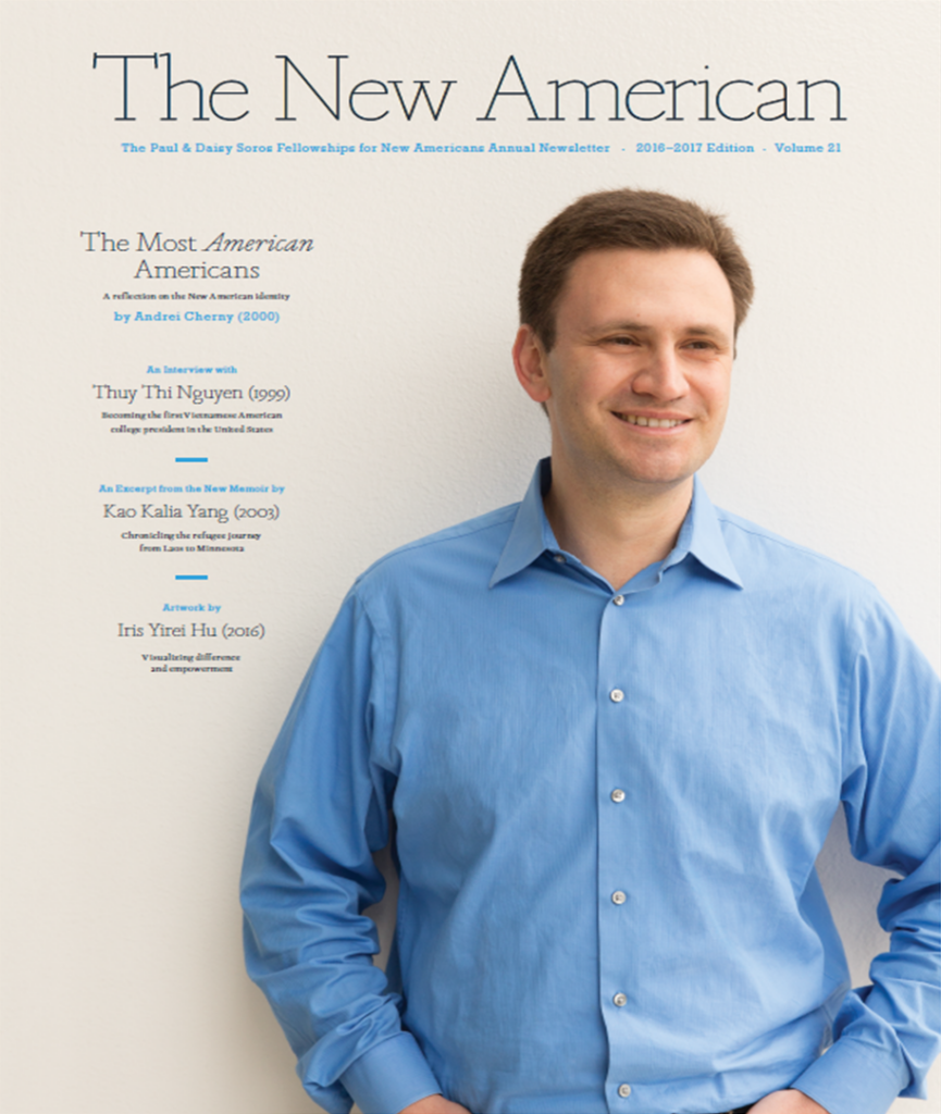 Magazine cover: Off-white background, on the right a man stands leaning against a wall with a light blue shirt and his hands in his pockets. He is in his 30s with heritage from Czech Republic with light skin tone and light brown hair. Across the top of the page it says "The New American" in black font. Down the left side featured articles are listed. 