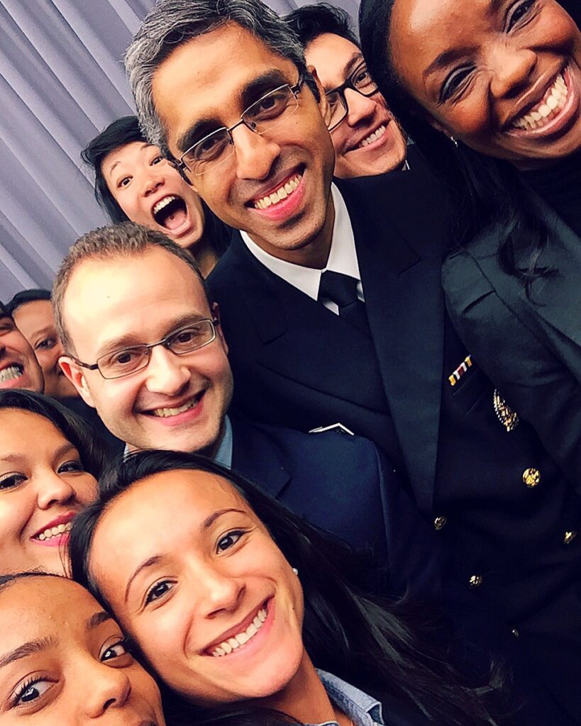 A selfie of a diverse group of Paul & Daisy Soros Fellows crammed into the photo lens. 