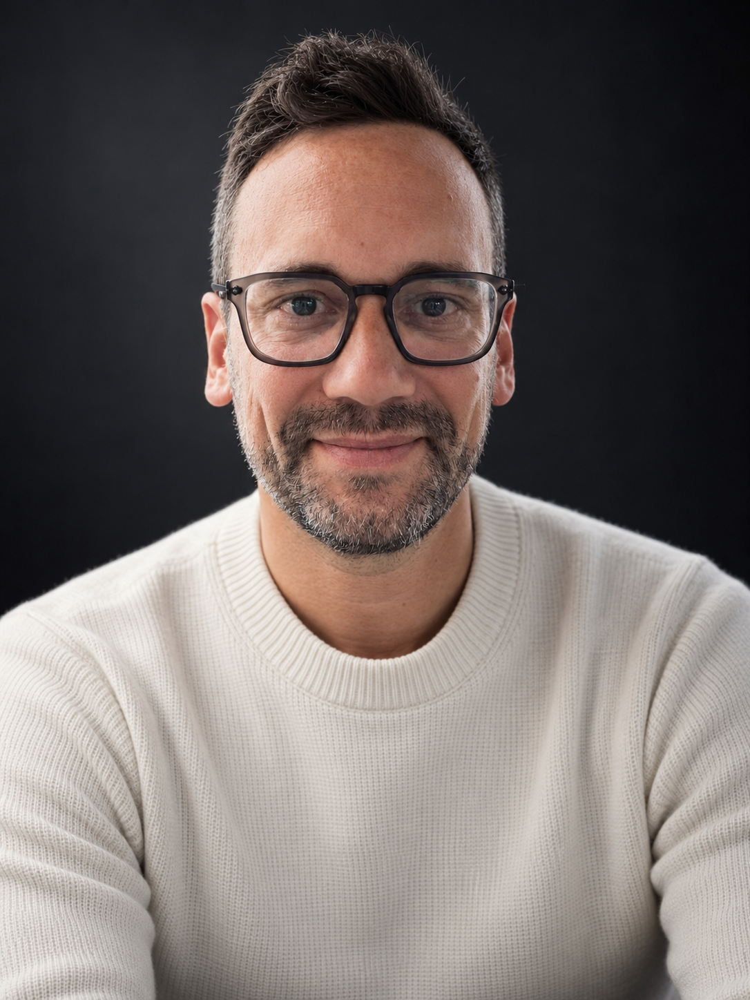 A headshot of Alex Iftimie